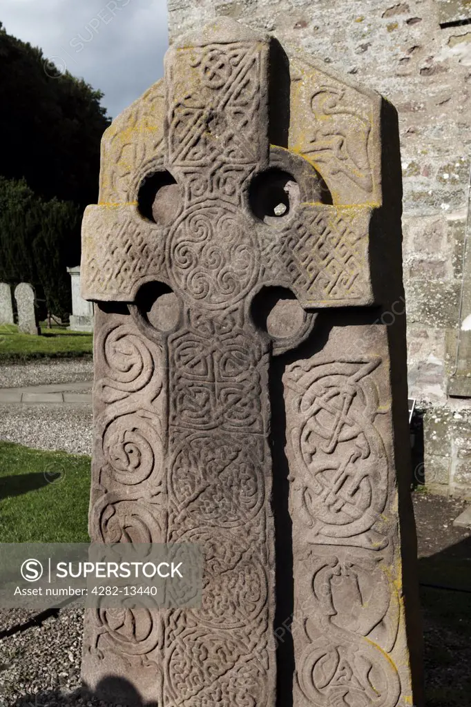 Scotland, Angus, Brechin. An Aberlemno sculptured stone in Aberlemno Kirkyard. The stone features a Celtic Cross in relief and a background of intertwined beasts. It is considered one of the finest surviving pieces of Pictish carving.