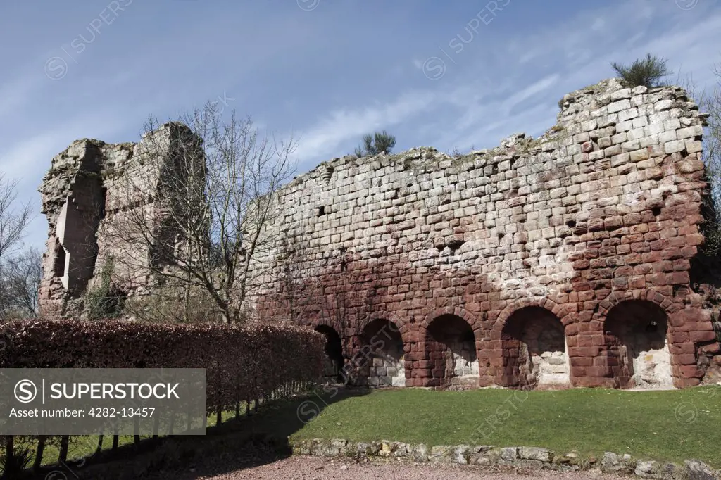 Scotland, Midlothian, Roslin. The 15th century west curtain wall and ruined keep of Roslin (Rosslyn) Castle near Rosslyn Abbey, largely destroyed during the War of the Rough Wooing in 1544.