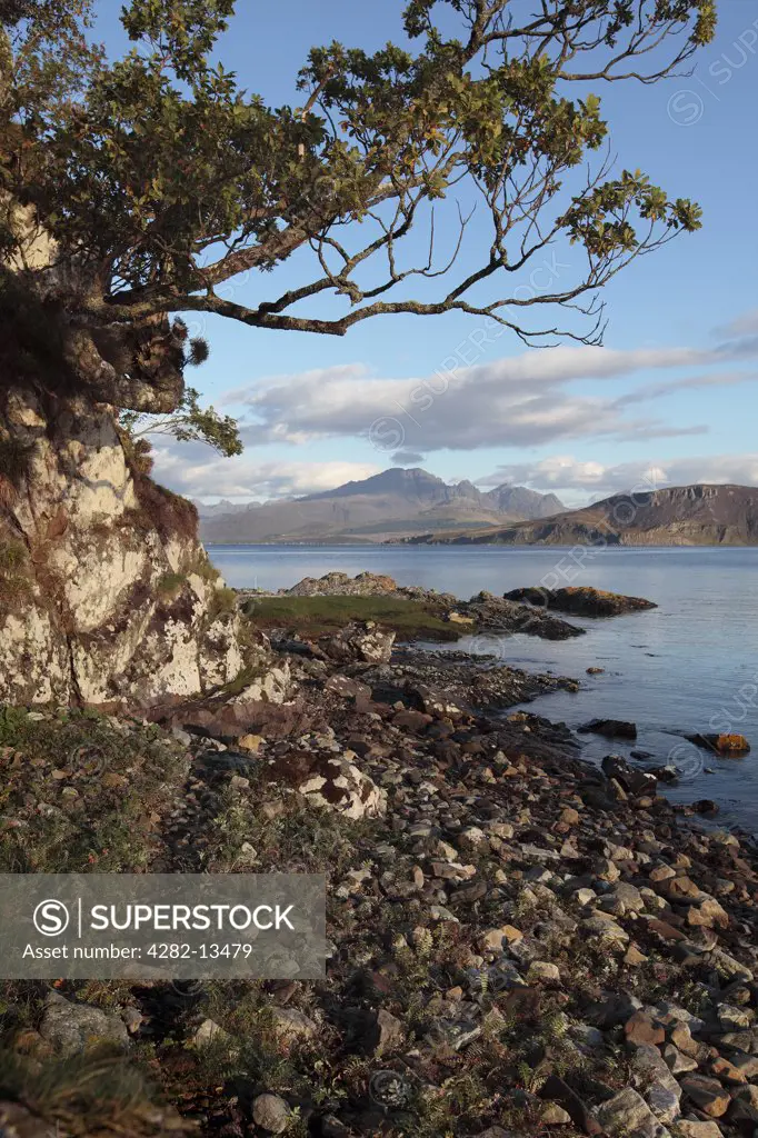 Scotland, Highland, Ord. View from the shore of Loch Eishort towards the Cuillins on the Isle of Skye.