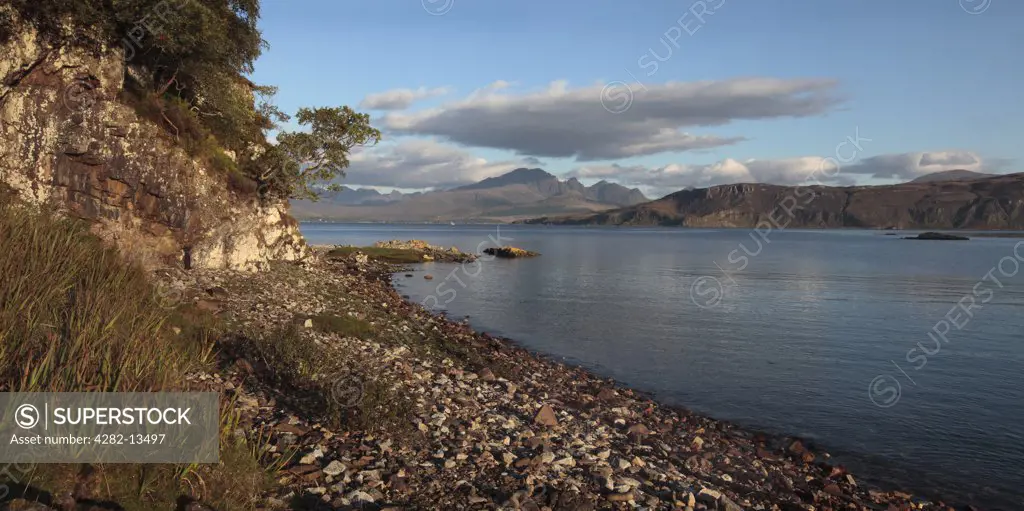 Scotland, Highland, Ord. View from the shore of Loch Eishort towards the Cuillins on the Isle of Skye.