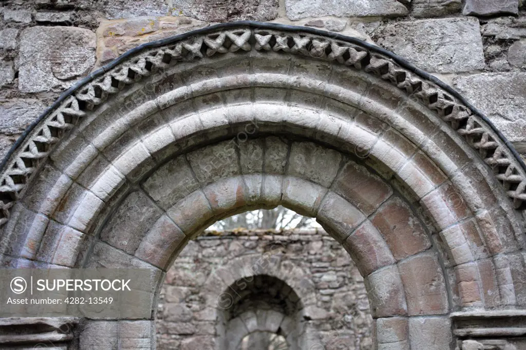 Scotland, Aberdeenshire, Auchindoir. The top of a Norman arched doorway in the south wall of St Mary's Kirk, Auchindoir built circa 13th century.