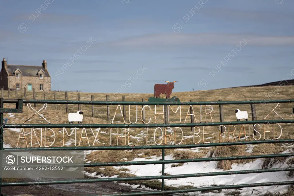 Scotland, Moray, Cabrach. Religious text on farm gate in the Cabrach, Morayshire.