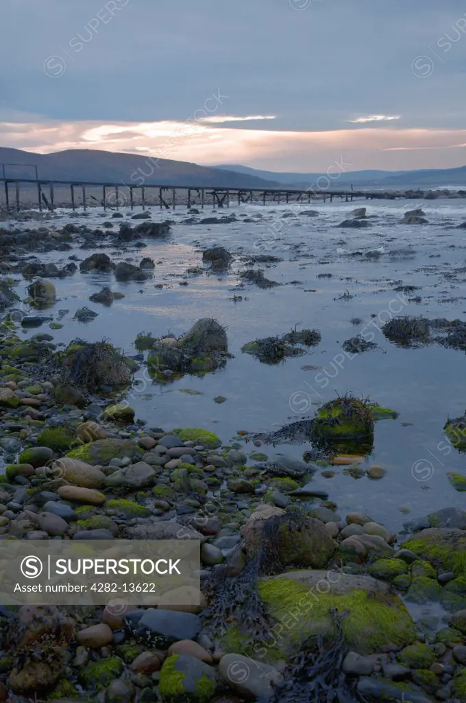 Scotland, North Ayrshire, Dougarie. Jetty and beach at Dougarie on the Isle of Arran.