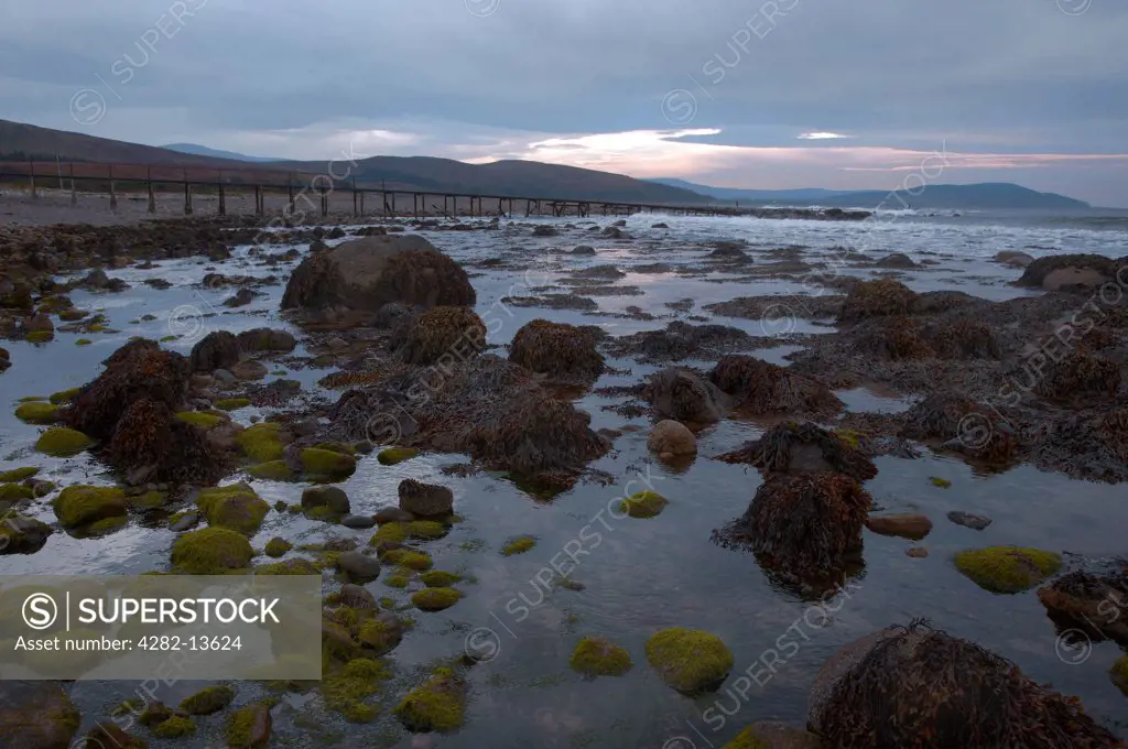 Scotland, North Ayrshire, Dougarie. Jetty and beach at Dougarie on the Isle of Arran.
