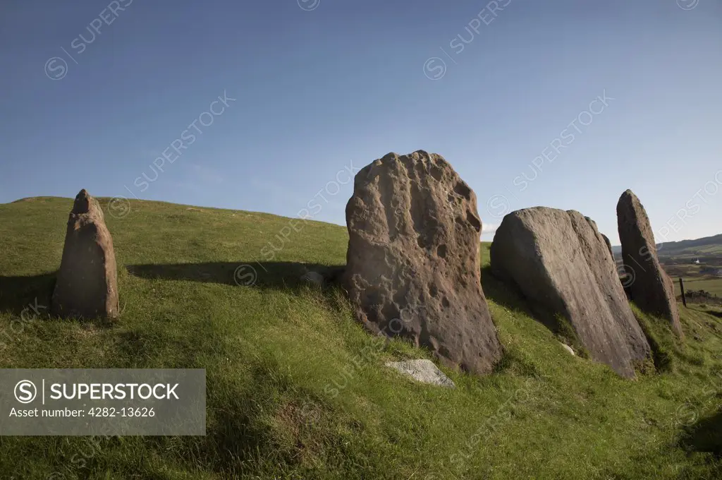 Scotland, North Ayrshire, Auchagallon. Auchagallon Stone Circle above Machrie Bay on the Isle of Arran. The stone circle dates back to around 2,000BC and comprises 15 upright sandstone slabs which encircle a large cairn.