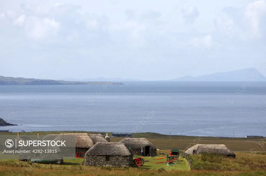 Scotland, Isle Of Skye, Kilmuir. A view toward a thatched blackhouse village at the Skye Museum of Island Life.