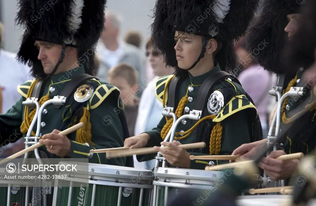 Scotland, Aberdeenshire, Strathdon. Highland drummers at the Lonach Highland Games.
