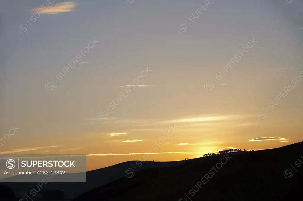 Scotland, Aberdeenshire, Glenkindie. Sunrise on the foothills of the Cairngorms.