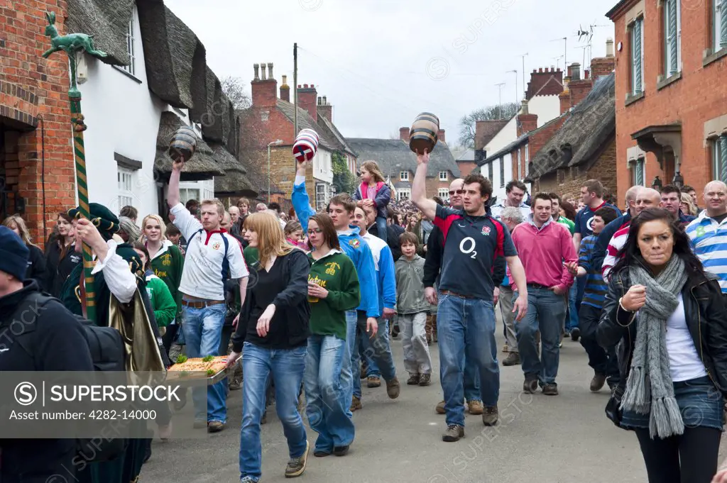 England, Leicestershire, Hallaton. A hare pie and three bottles (kegs) are paraded through the village of Hallaton, part of the traditional Easter Monday hare pie scramble and bottle-kicking event.