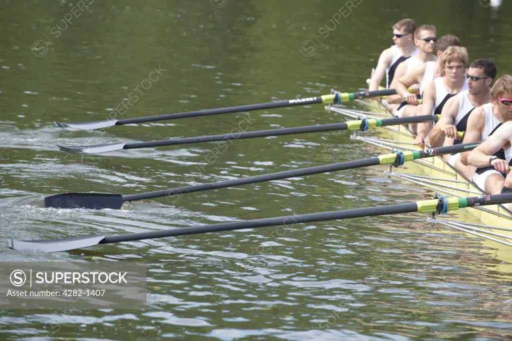 England, Oxfordshire, Henley-on-Thames. A boat crew competing at the the annual Henley Royal Regatta.