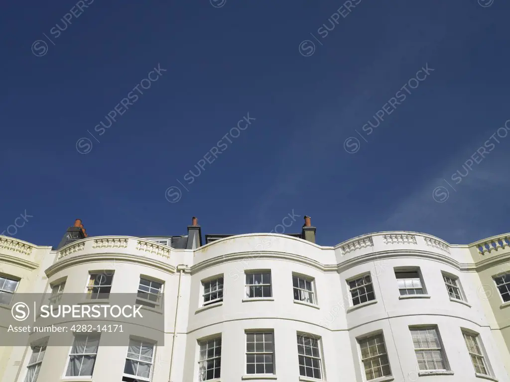 England, East Sussex, Hove. Looking up at the tops of Regency houses in Hove.