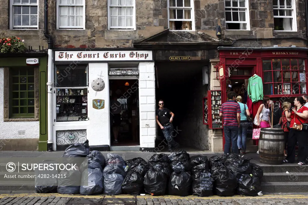 Scotland, City of Edinburgh, Edinburgh. Rubbish bags mounting up in the Royal Mile due to a strike.