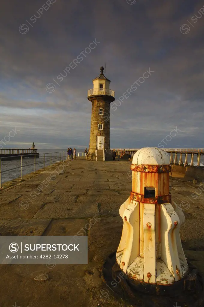 England, North Yorkshire, Whitby. Whitby Pier taken late afternoon as the sun falls.