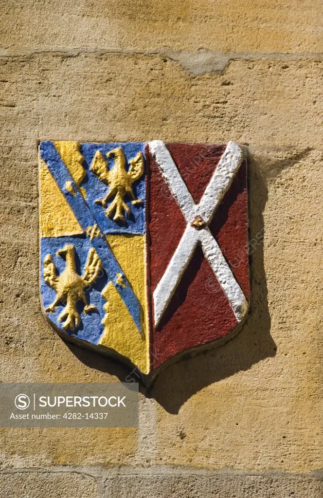 England, Cambridgeshire, King's College. A coat of arms outside King's College at Cambridge University. The young Henry VI laid the first stone of the King's College in 1441.