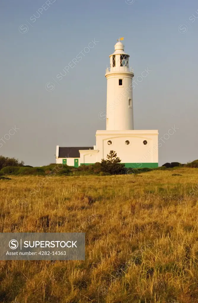 England, Hampshire, Milford-on-Sea. A view toward Hurst Point Lighthouse. It guides vessels through the Solent and the Needles Channel.