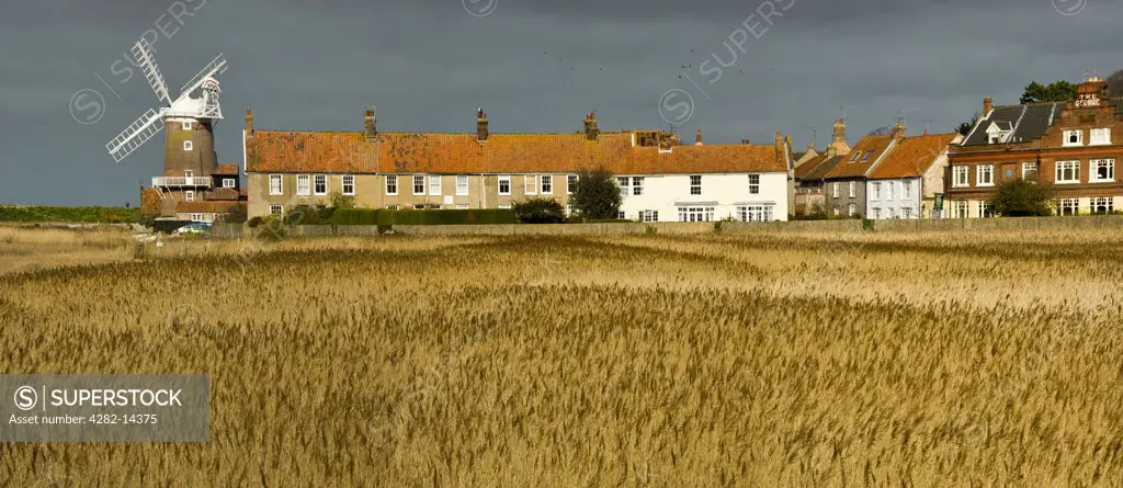 England, Norfolk, Cley. A panoramic view of Cley Windmill and the village.