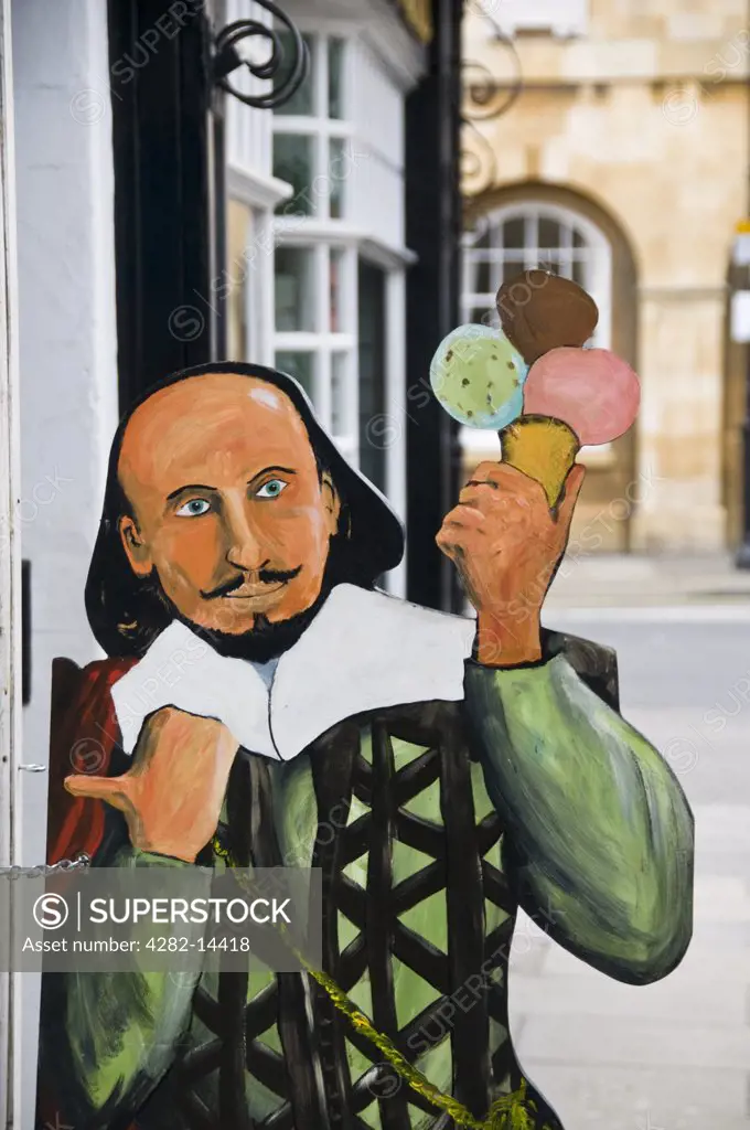 England, Warwickshire, Stratford upon Avon. A painted Shakespeare shop sign for an ice cream parlour in Warwickshire.