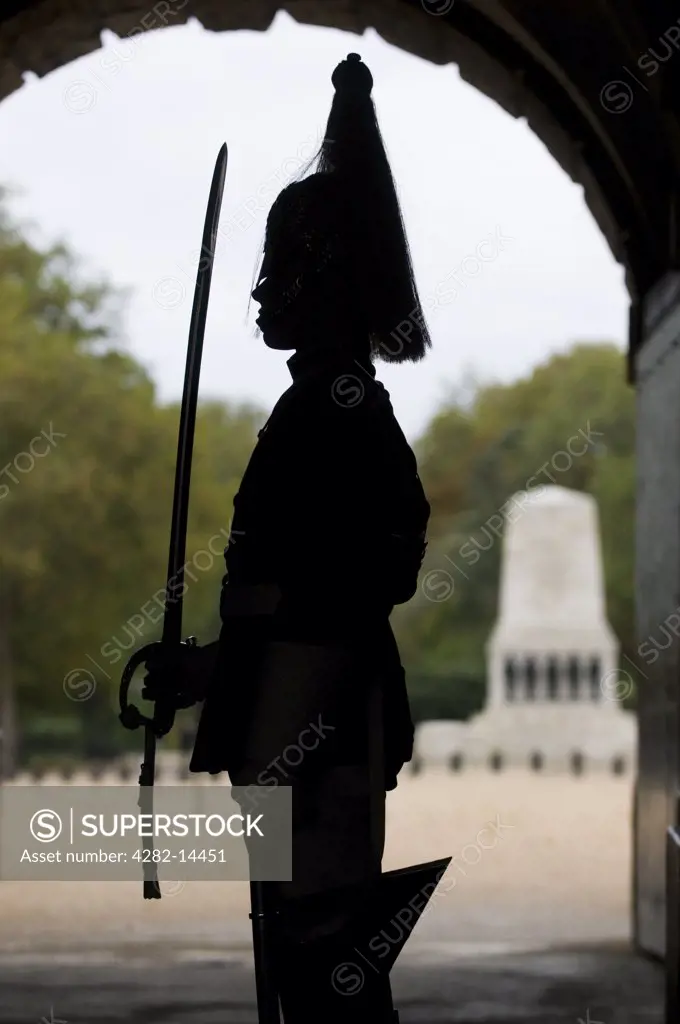 England, London, Whitehall. Silhouette of a soldier of the Household Cavalry on guard duty at Horse Guards in Whitehall.