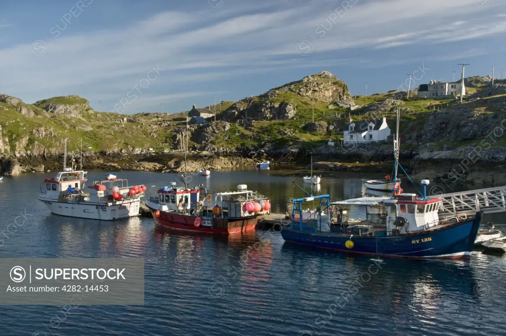 Scotland, Highland, Harris. A view of the harbour at Scalpay just off of the Isle of Harris.
