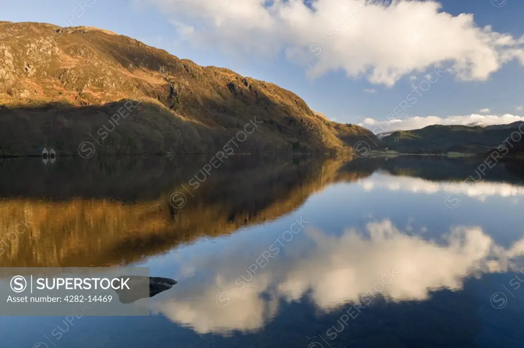 Wales, Gwynedd, Snowdonia . The sky reflected in Llyn Dinas lake in the Nant Gwynant valley.
