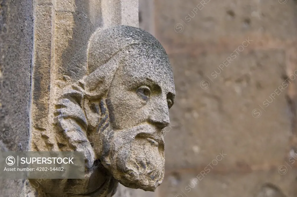 England, Oxfordshire, Oxford. Stone carving on the walls of the University of Oxford.