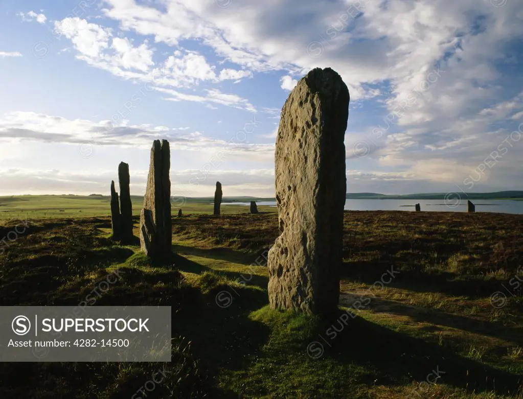 Scotland, Orkney, Brodgar. Ring of Brodgar stone circle and henge looking towards the Loch of Harray.
