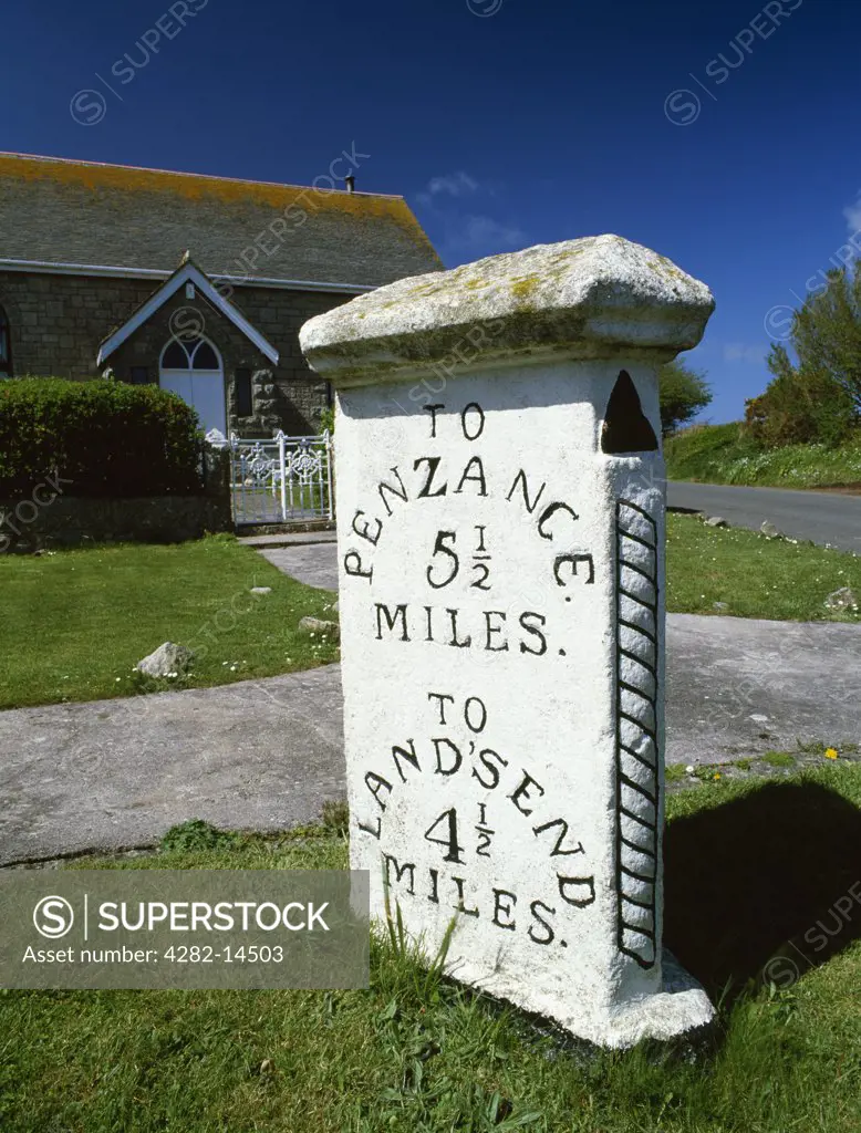 England, Cornwall, Crows-an-wra. A three-sided milestone and converted chapel at a junction on the A30 road between Penzance and Land's End.