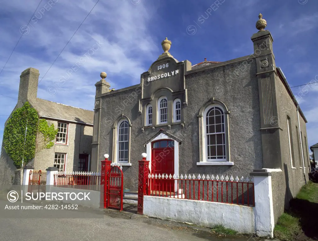 Wales, Anglesey, Rhoscolyn. Rhoscolyn Baptist chapel, minister's house and schoolroom, founded in 1787 although the classical facade on the present building is dated 1906.
