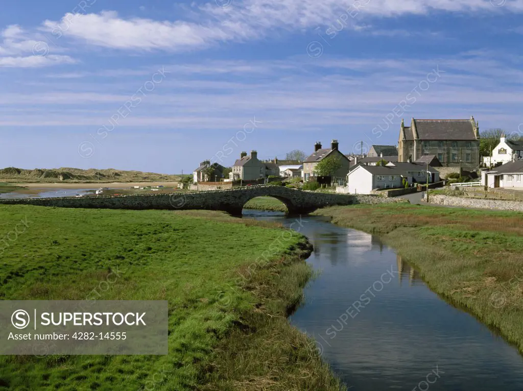 Wales, Anglesey, Aberffraw. The River Ffraw flows to the dunes and coast under Hen Bont, built 1731 by Sir Arthur Owen of Bodowen, which was the main road bridge until 1932.