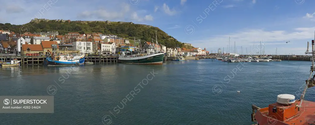 England, North Yorkshire, Scarborough. Panoramic view of Scarborough Inner Harbour.