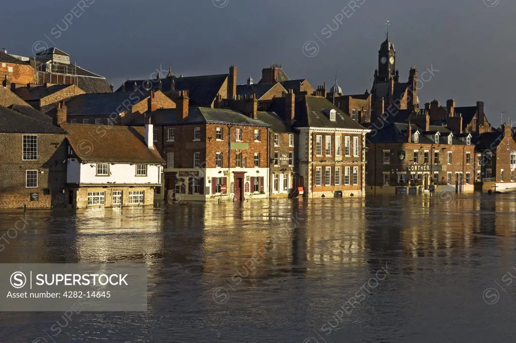 England, North Yorkshire, York. View of King's Staith in York with the River Ouse in flood.