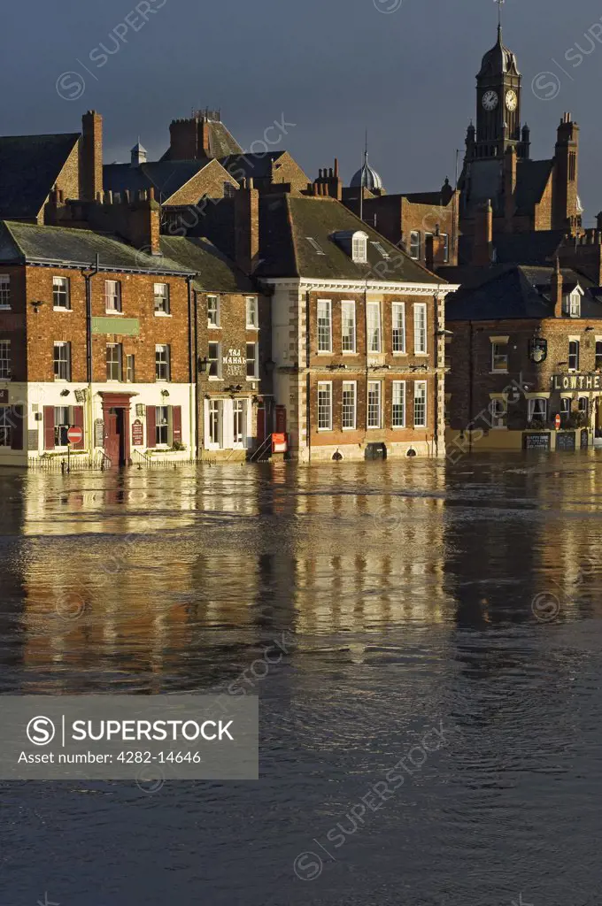 England, North Yorkshire, York. View of King's Staith in York with the River Ouse in flood.