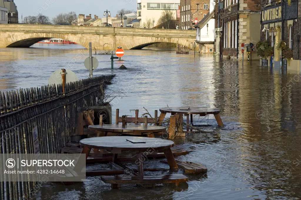 England, North Yorkshire, York. View of King's Staith and Ouse Bridge in York with the River Ouse in flood.