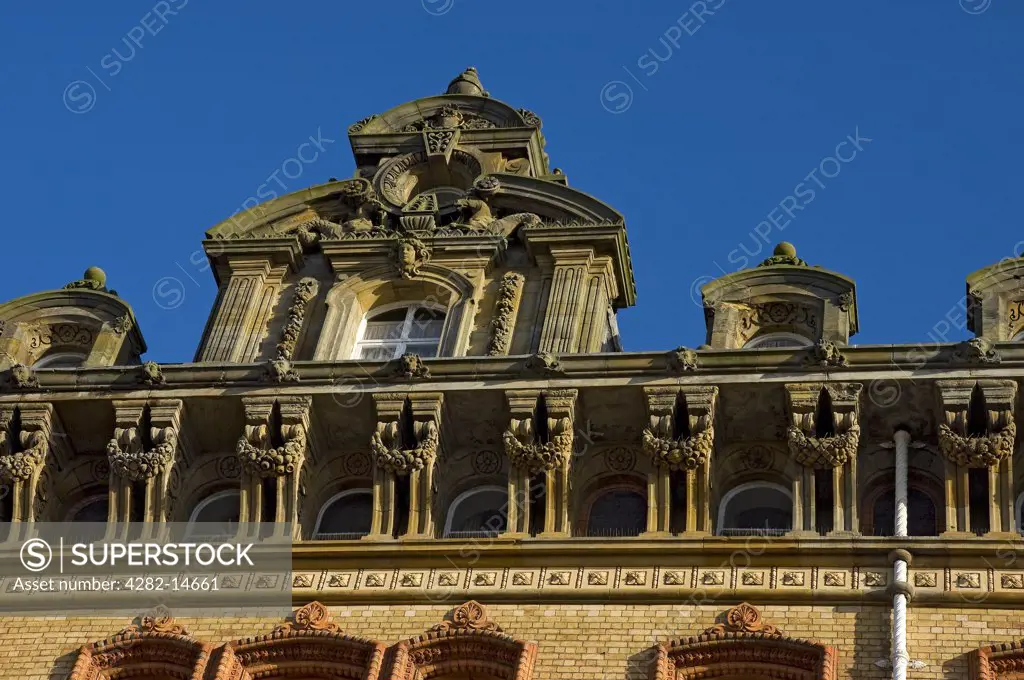 England, North Yorkshire, Scarborough. Looking up at the ornate Victorian facade of the Grand Hotel in Scarborough. Originally constructed in 1863, it was one of Europe's first purpose-built hotels.