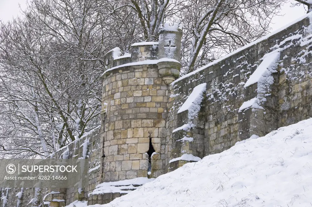 England, North Yorkshire, York. Snow on and around the York City walls.