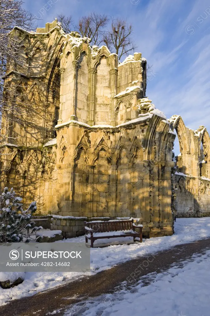 England, North Yorkshire, York. The ruins of St Mary's Abbey in the Yorkshire Museum Gardens in winter.
