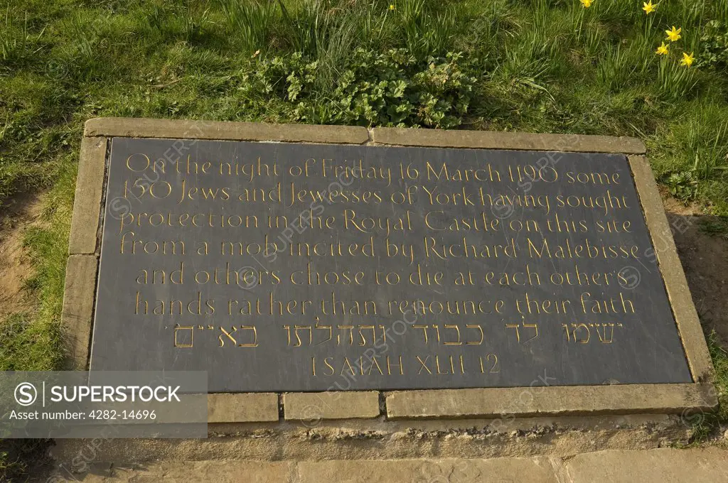 England, North Yorkshire, York. Plaque at the base of Cliffords Tower to commemorate the massacre of Jews on Friday 16th March 1190.