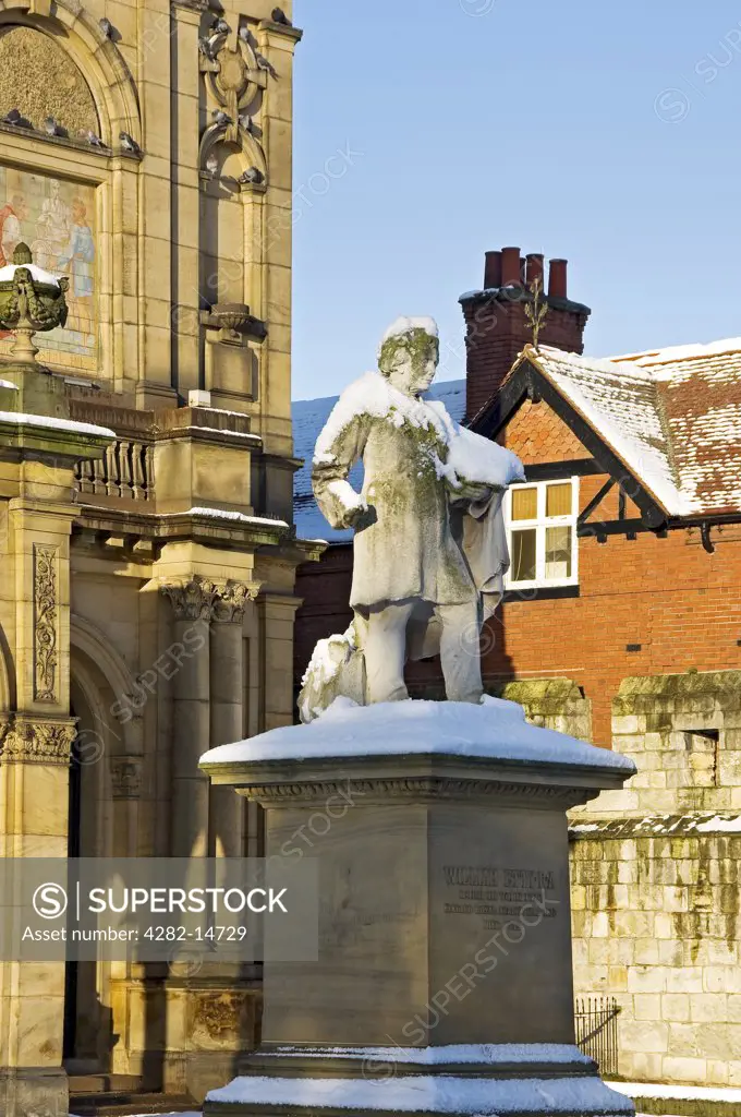 England, North Yorkshire, York. Snow on the statue of York artist William Etty, erected in 1911, outside the York Art Gallery (City Art Gallery) in winter.