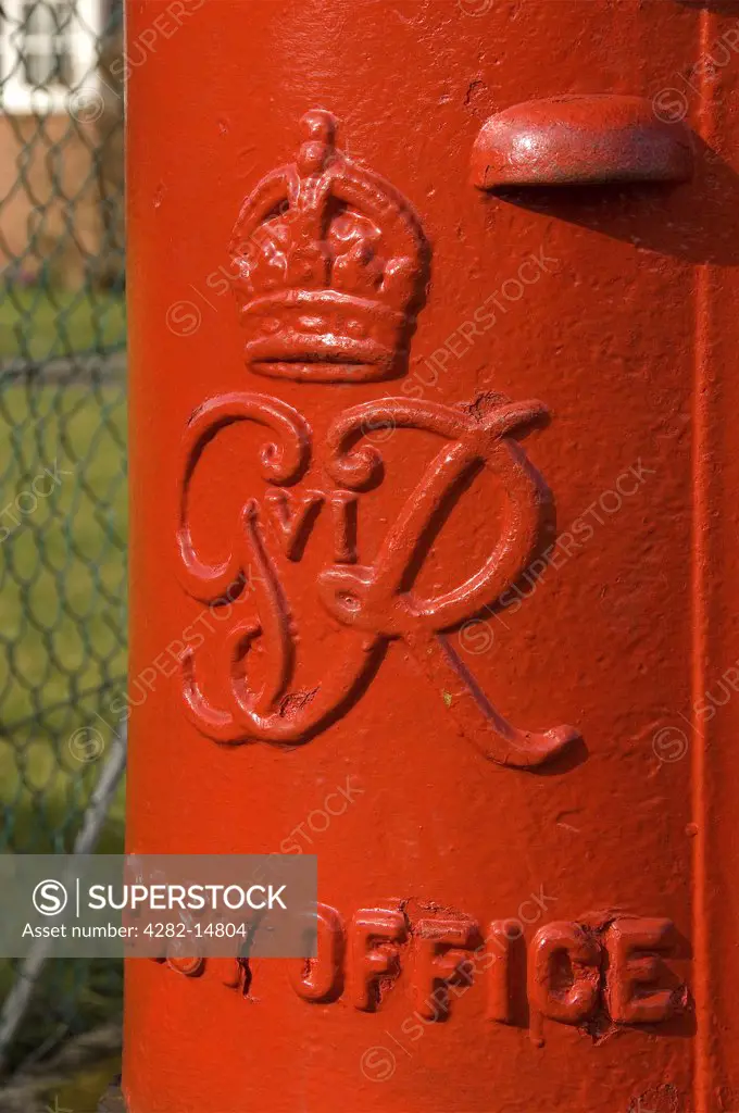 England, North Yorkshire, Ripon. Close up of GR (George Vl) red post box.