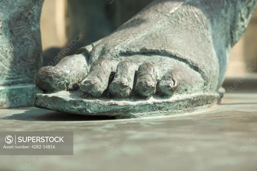 England, North Yorkshire, York. Close up of the foot of Constantine the Great bronze statue outside the South Transept of York Minster.