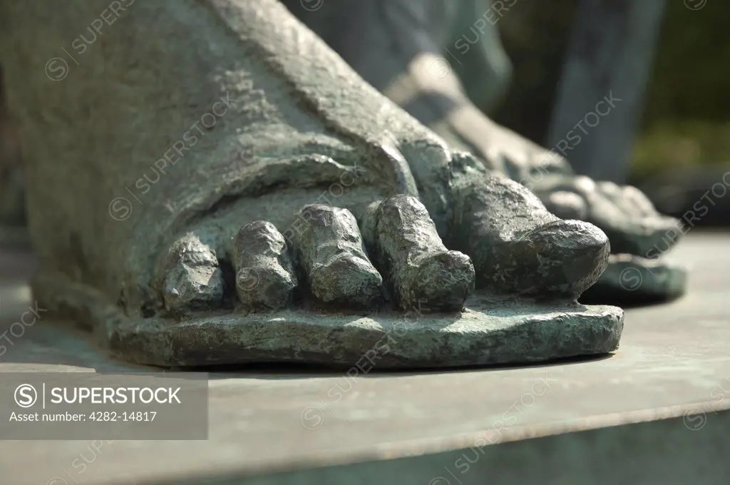 England, North Yorkshire, York. Close up of the feet of Constantine the Great bronze statue outside the South Transept of York Minster.