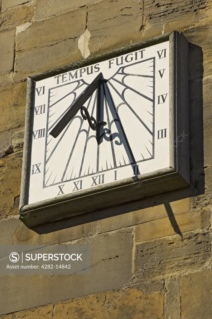 England, East Riding of Yorkshire, Bridlington. Sun dial on the wall of Bridlington Priory Church (St Mary).