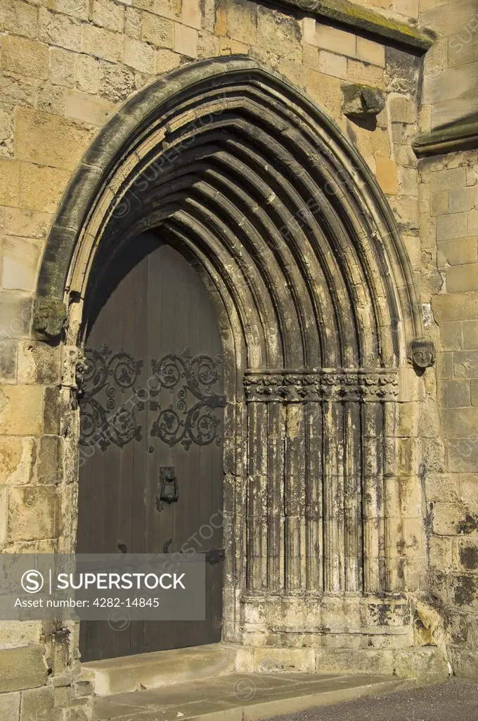 England, East Riding of Yorkshire, Bridlington. Side Door of Bridlington Priory Church (St Mary).