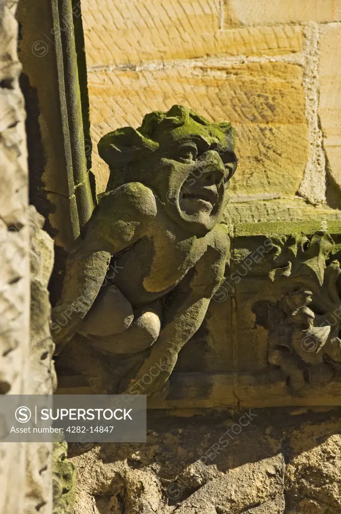England, East Riding of Yorkshire, Bridlington. Grotesque on the wall of Bridlington Priory Church (St Mary).