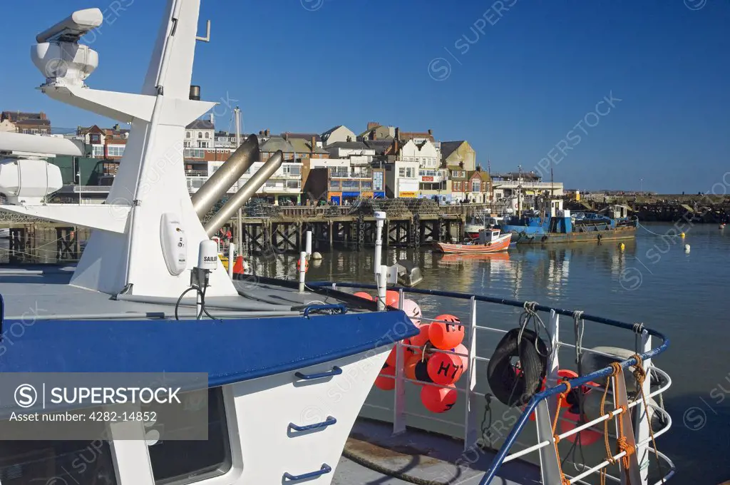 England, East Riding of Yorkshire, Bridlington. Boats moored in bridlington harbour, both a holiday resort and fishing port.