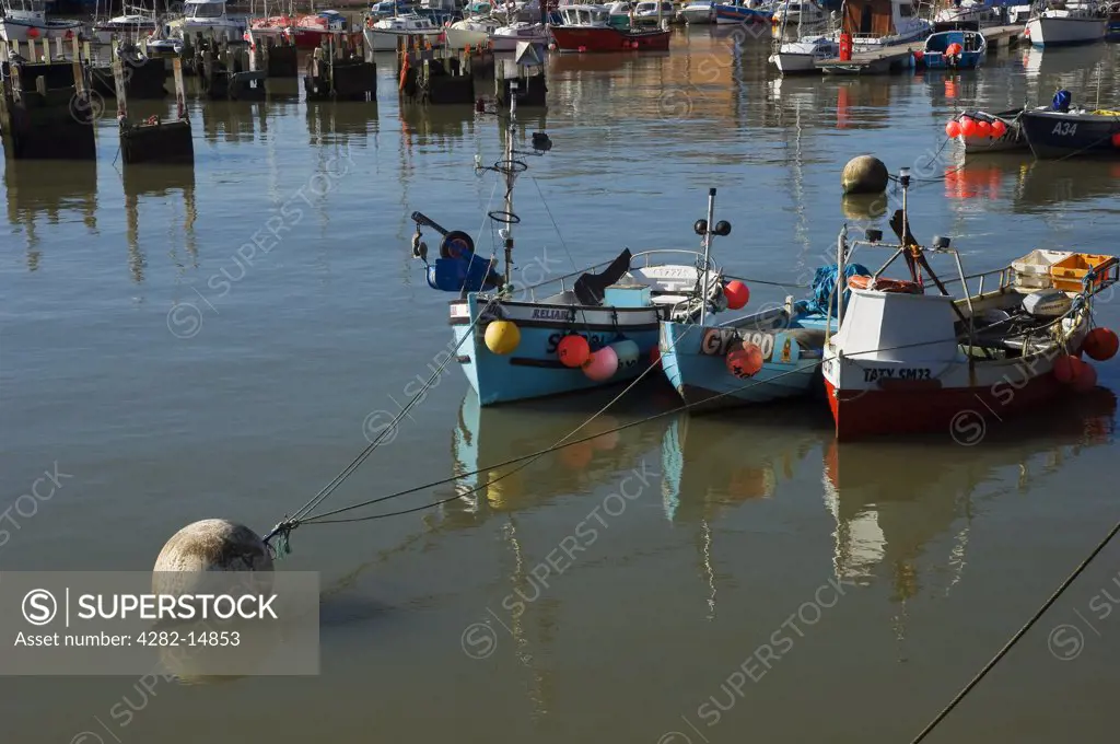 England, East Riding of Yorkshire, Bridlington. Fishing boats moored in Bridlington harbour.