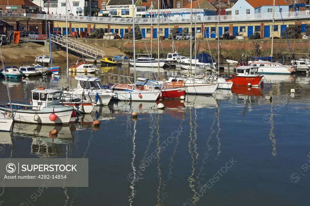 England, East Riding of Yorkshire, Bridlington. Fishing boats and yachts moored in Bridlington harbour.