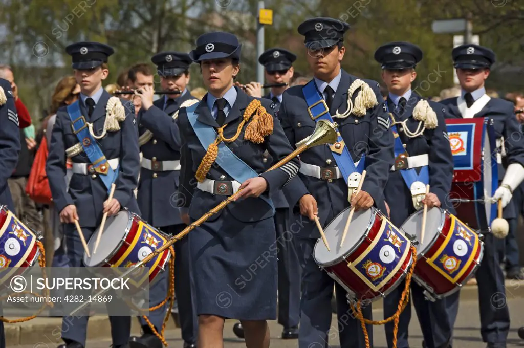 England, North Yorkshire, York. Young men and women in the band of the Air Training Corps band parading in the annual Saint George's Day parade.