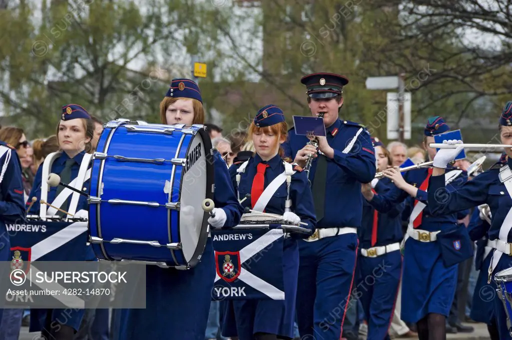 England, North Yorkshire, York. Musicians in the St Andrews Church Lads and Church Girls Brigade band parading in the annual Saint George's Day parade.