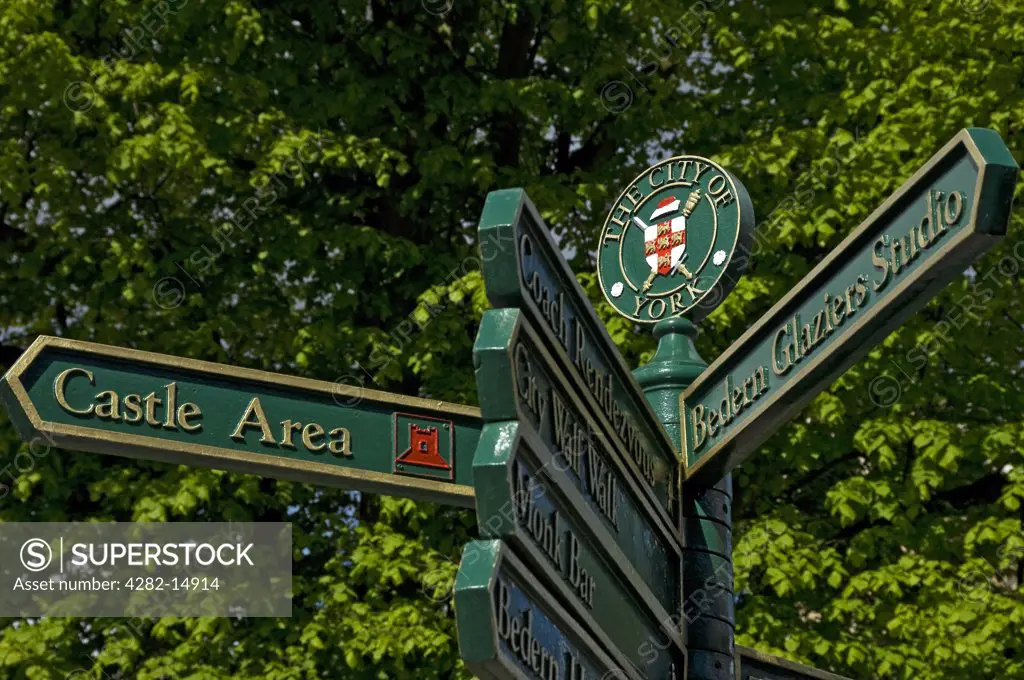 England, North Yorkshire, York. A sign post with directions to some of York's famous attractions.